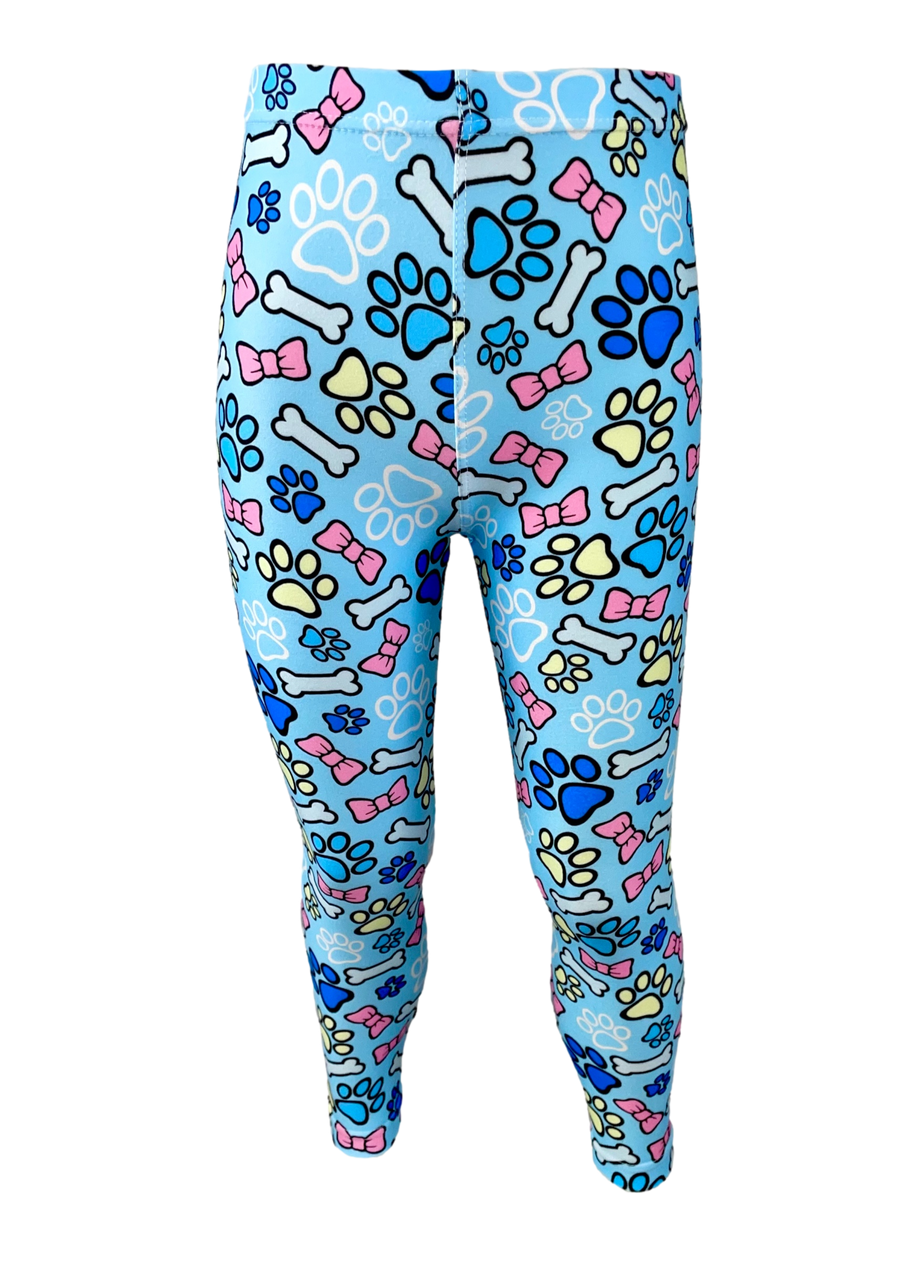 Baby blue leggings with pink bows, light blue bones, white line paws and blue and yellow paw prints. The pictures are outlined with black.